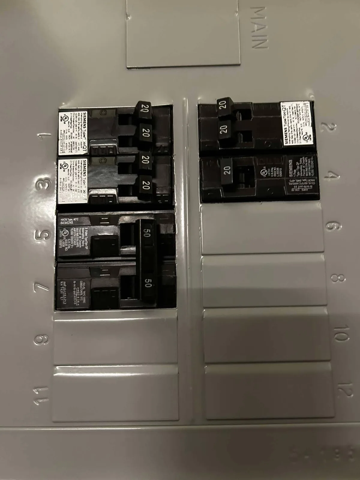 Electrical panel photographed during a home project review