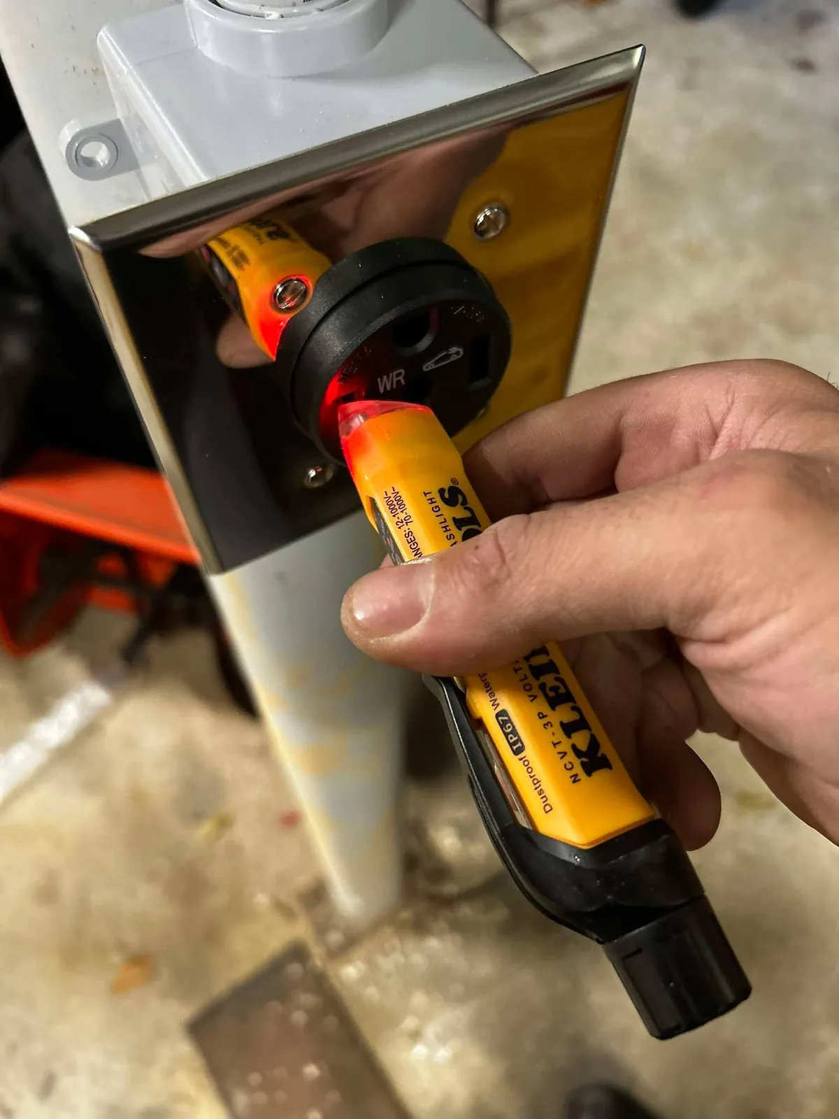 Close-up of outlet and electrical device work during a home improvement project